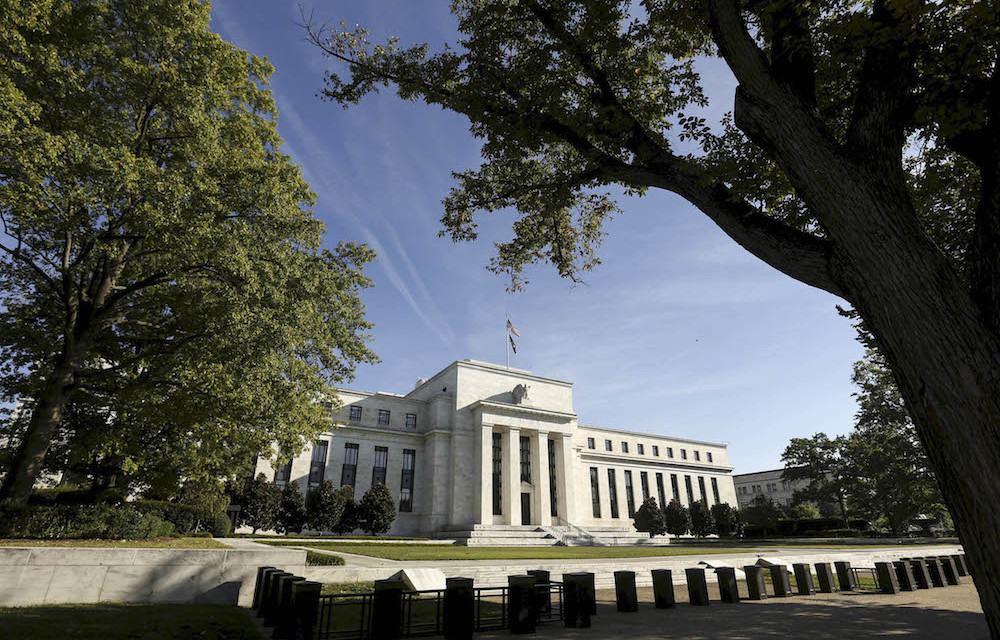 Fed rebalancing rocks markets